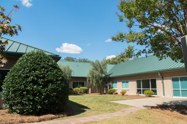An exterior view of the campus at Riverwoods Behavioral Health